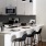 Kitchen with stainless steel appliances and breakfast bar