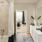 Bathroom with double sink vanity and tub/shower combo