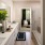 Bathroom with double sink vanity with walk-in shower
